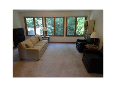 Living Room-L1. Wall of Windows for view of nature