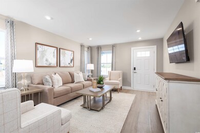 Living room with hardwood / wood-style floors