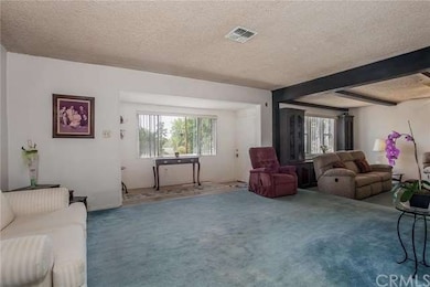 Open concept living room to den 