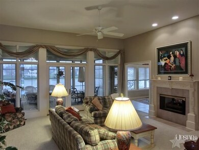 Great room with 2 way gas log fireplace (was wood 