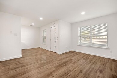 Unfurnished room featuring baseboards, a healthy 