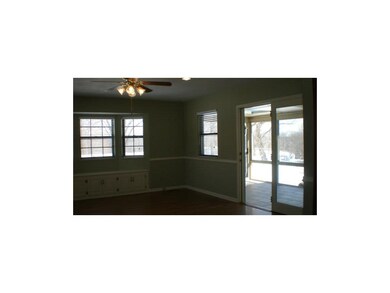 Family Rm Leads to Enclosed Sunroom!