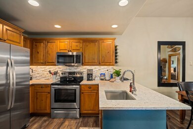 Kitchen with appliances with stainless steel finis