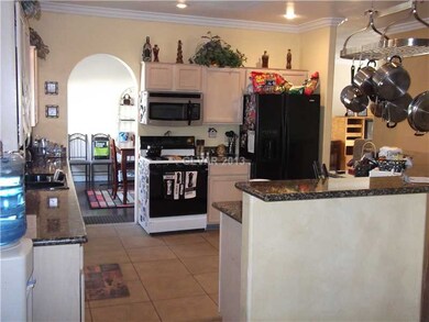 Kitchen. This home s kitchen features granite coun