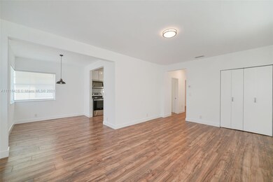 spacious living/dining area with kitchen in the ba