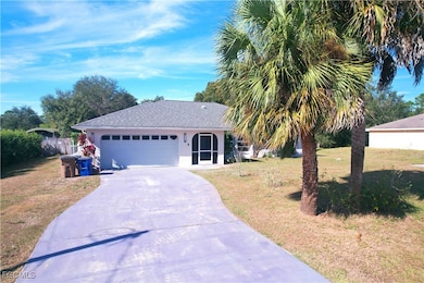 511 Thompson Ave, Lehigh Acres, FL 33972 - photo 2