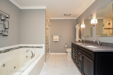 Amenities galore!  Heated floor, whirlpool tub, du