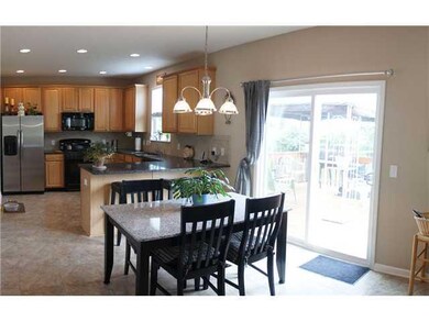 Breakfast Area/Room. Open concept - view from family room to breakfast area and into kitchen.