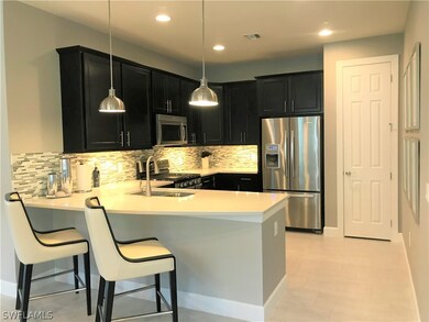 Beautiful Granite Counters and backsplash.  Almost