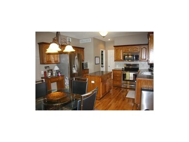 Hardwood floors and stainless appliances