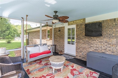 View of patio / terrace featuring a ceiling fan and an outdoor hangout area