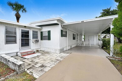 Front view with carport