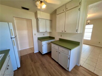 Kitchen featuring ceiling fan