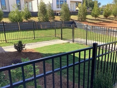 Photos not of actual home but a similar floor plan built previously. This homesite is under construction. Fenced in Front Yard for courtyard