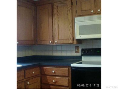 Kitchen. One angle of kitchen, note built in microwave.  All appliances are negotiable.