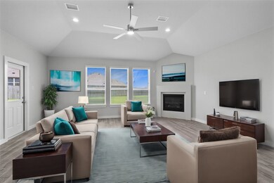 This living room is a perfect room! Featuring fireplace, custom paint, soaring high ceiling, recessed lighting, ceiling fan, and an amazing wall of windows providing a plenty of natural lighting!