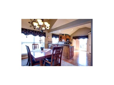 Notice how open the kitchen and dining areas are w