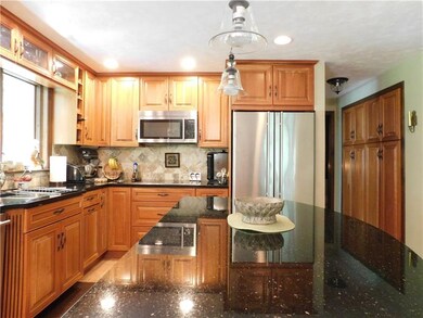 Highlights are granite counter tops, stainless ste