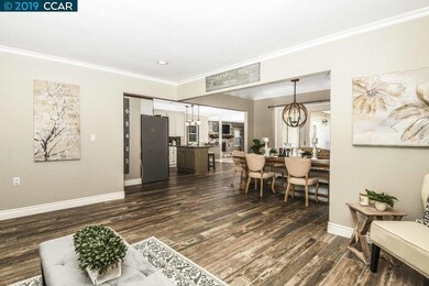 Living room opens up to dining area, great for ent