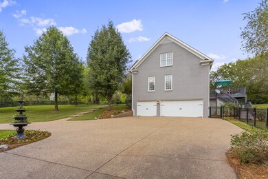 Basement garage has space for a 4th car tandem, plenty of space on the driveway plus a covered spot attached to the storage shed perfect for a boat or ATV