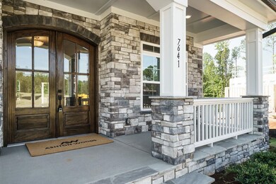Full porch stone accents