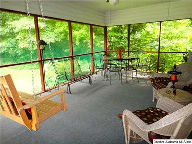RELAX ON THE SPACIOUS AND AIRY SCREENED-IN PORCH