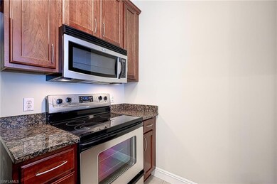 Kitchen with appliances with stainless steel finis