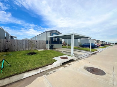 Upgraded Covered Parking Spaced & A sprinkler system.