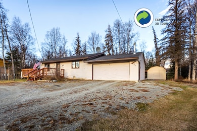 Side of home with shed