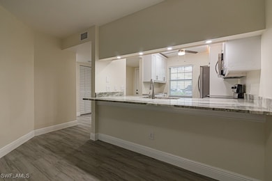 2566 Kings Lake Blvd unit 104, Naples, FL 34112 - photo 2