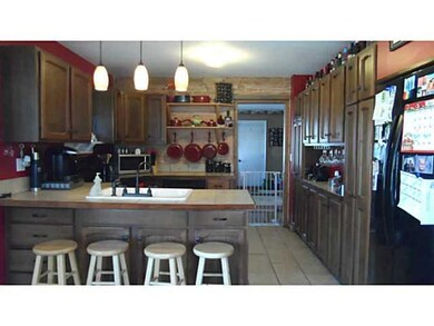 Other. View of kitchen. Wall of cabinets/pantry.