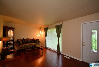 Beautiful gleaming hardwoods as you enter the home