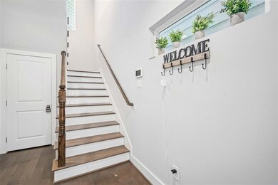 As you walk through the door, you are greeted by t
