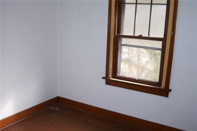 bedroom with hardwood floors