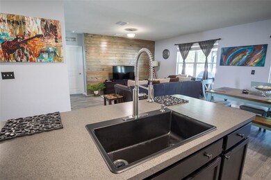 View from Kitchen Sink / Island to Show Open Floor