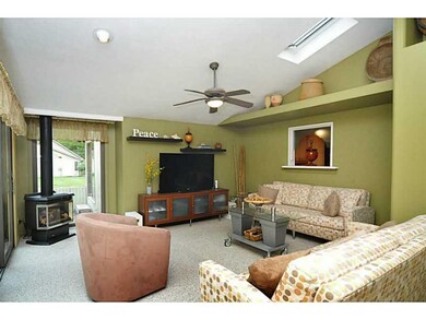 Sunroom. The sunroom offers four sliding glass doo