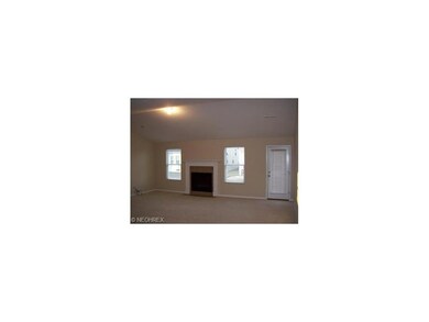 Spacious great room with vaulted ceilings.  Gas fi