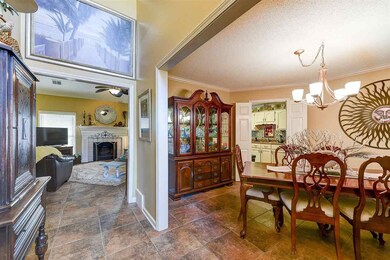 The foyer also features tile floor that leads into