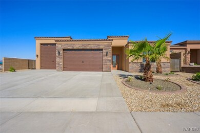 View of front of property with a garage