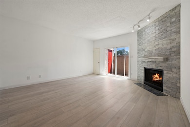 Cozy living room with a fireplace, elegant sliding