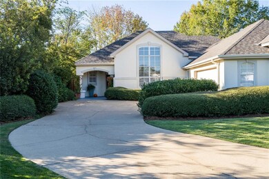 There is a 2 car garage and a roof gutter system.