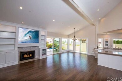 Vaulted ceiling, open concept living and dining wi