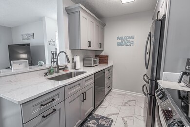 Kitchen featuring appliances with stainless steel 