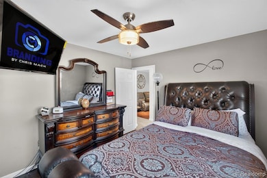 Bedroom featuring a ceiling fan