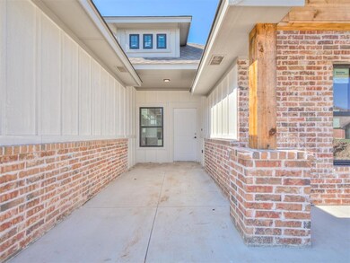 Doorway to property with a patio