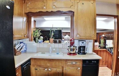 Kitchen Overlooks Second Living Area