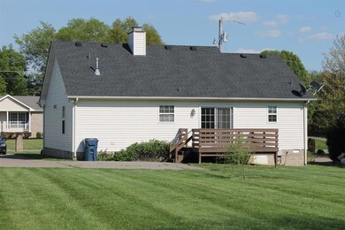View of back of home  New Roof -2013; New Hot Water Heater - 2015; New Deck Boards - 2013