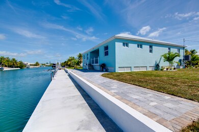 009-208334thaveW-CudjoeGardens-FL-33042-