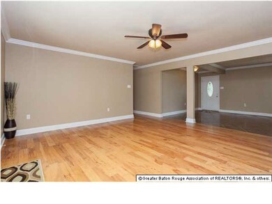 FAMILY ROOM WITH OPEN VIEW OF LIVING ROOM