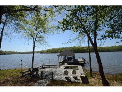 Private dock with boat lift and large deck for wat